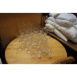 A quantity of drinking glasses