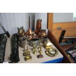 A quantity of metalware to include brass candle st