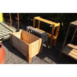 A wooden oblong planter; together with saw horse a