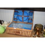 A wicker picnic hamper