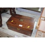A mahogany brass bound writing box