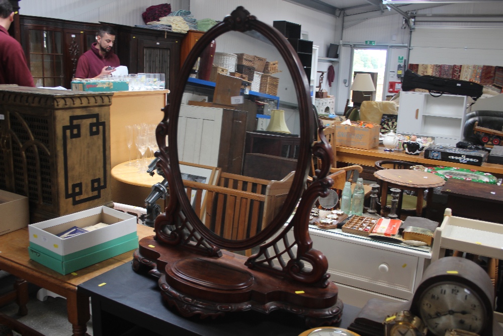 A Victorian mahogany swing framed mirror