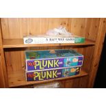 Two boxed Kerplunk games; a railway game and a sol