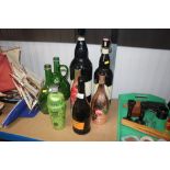 A quantity of empty drinks bottles etc