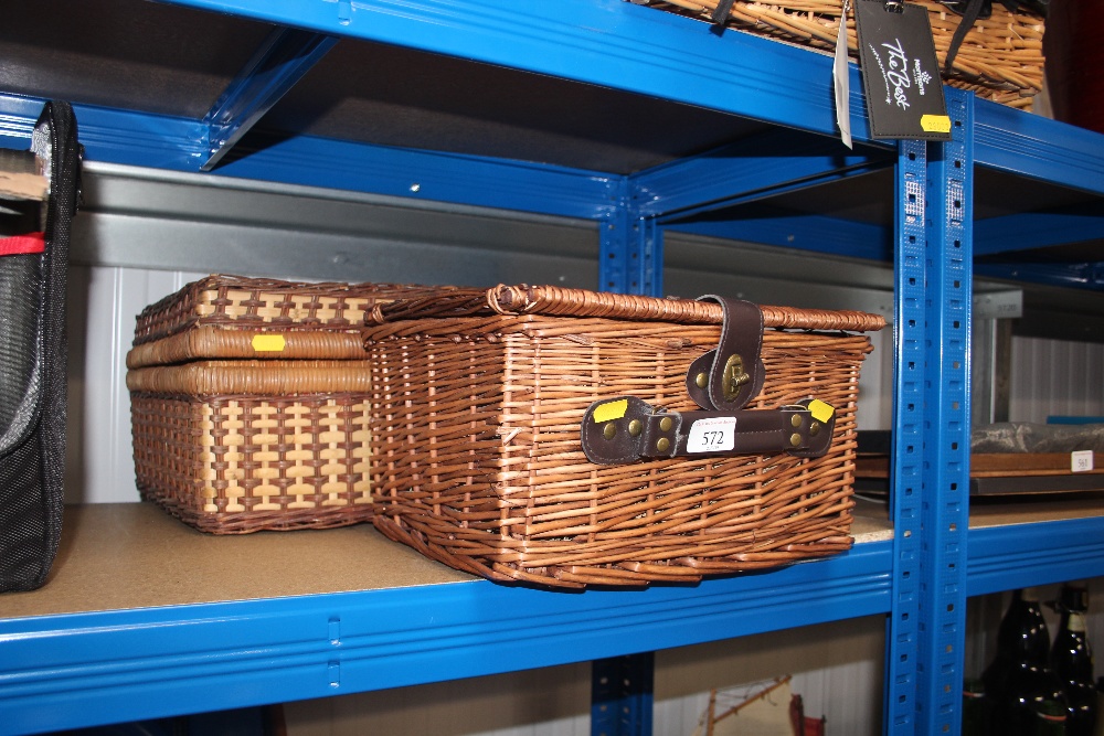 A wicker picnic hamper and contents; together with