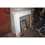 A white painted fire surround