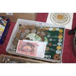 A box of various coinage and bank notes