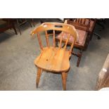 A pine spindle back chair