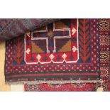 An approx. 4' 5" x 2'10" Balochi rug