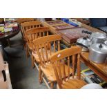 A set of five pine Ducal kitchen chairs