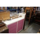 Three pink and white painted chests together with