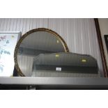 A bevel edged wall mirror together with a gilt fra