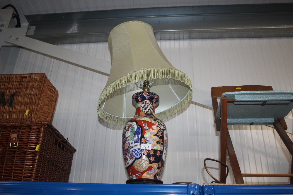 An oriental table lamp and shade