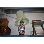 An oriental table lamp and shade