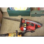 A Homelight petrol chainsaw lacking chain