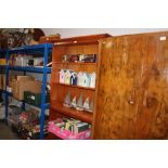 A reproduction ewe wood open fronted bookcase