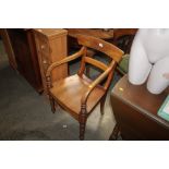 A mahogany bar back armchair