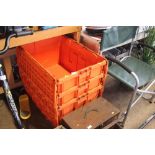 Three plastic storage crates