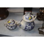 An "Old Willow" patterned teapot; together with an