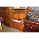 A teak cabinet fitted two drawers