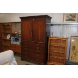 A mahogany 19th Century linen press fitted five lo