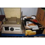 A box containing a projector; tripod; box camera e
