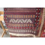 An approx. 6'8" x 2'2" Caucasian patterned rug