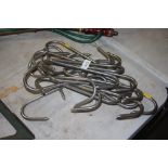 A quantity of meat hooks