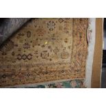An approx. 8'2" x 5'10" patterned rug