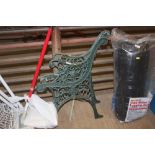 A pair of metal garden bench ends