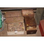 Four wooden trays of various brass screws etc