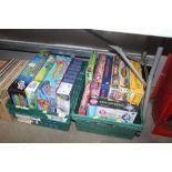 Two boxes of puzzles and games
