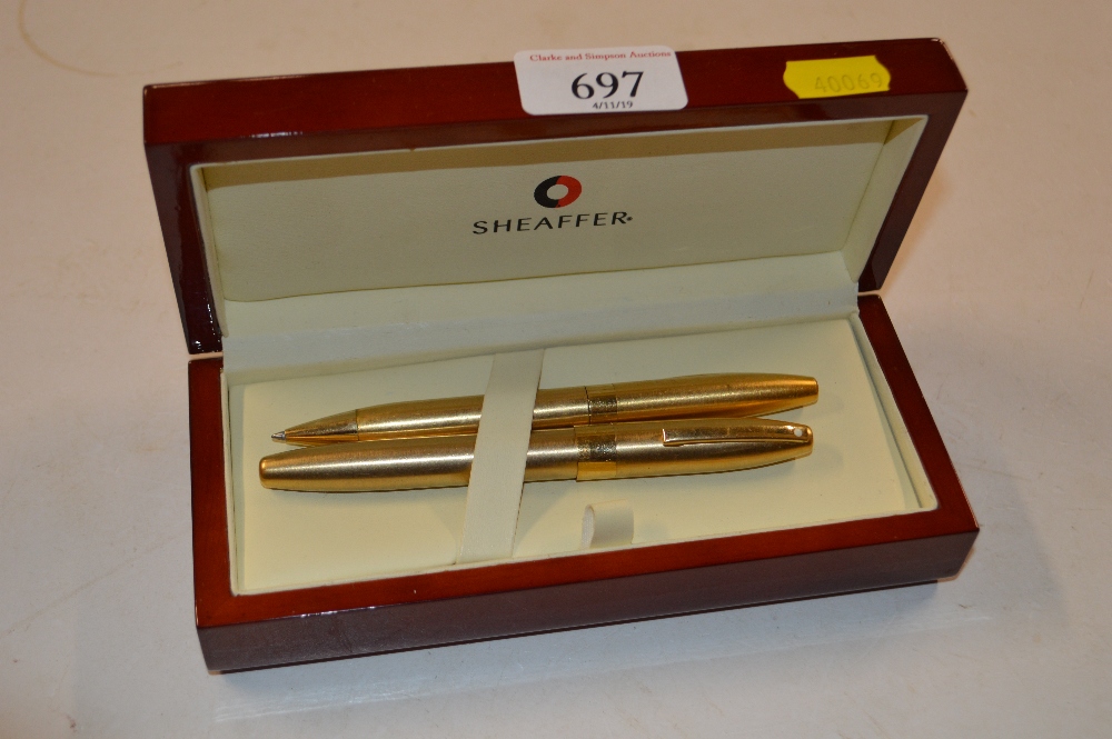 A Sheaffer gold plated ball point pen, and fountai