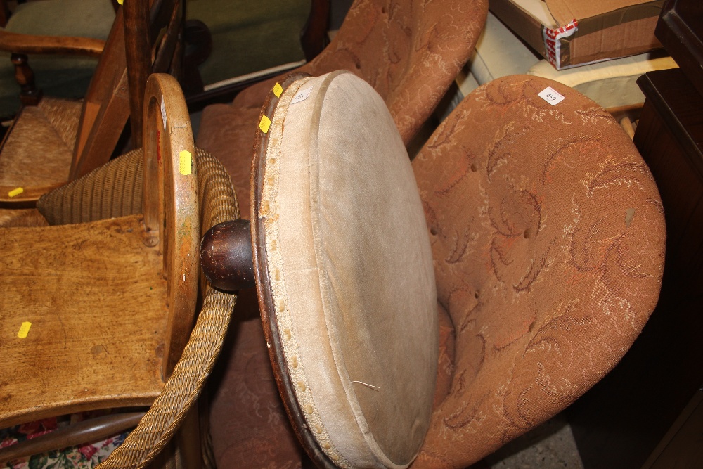 A late Victorian circular stool raised on four bal