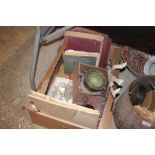 A box containing a compass; books; decanter stoppe