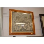 A George IV maple framed needlework sampler named