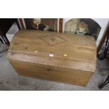 A stripped pine dome top trunk with stud work deco