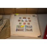 A world stamp collection on album pages, includes