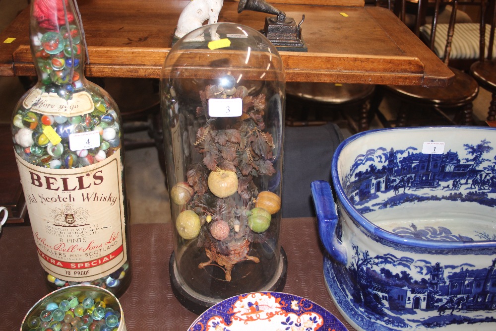 A Victorian glass dome on stand