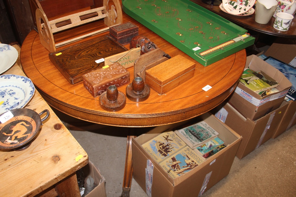 A reproduction mahogany extending dining table