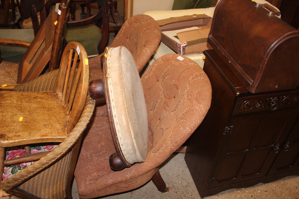 A pair of Victorian mahogany framed tub shaped nur