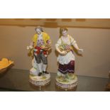 A pair of continental porcelain figures AF