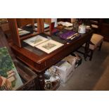 A Victorian mahogany writing table fitted four opp