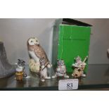 A Beswick owl and a cat band