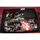 A tub of various costume jewellery