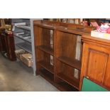 An oak open fronted bookcase