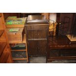 An oak gramophone cabinet