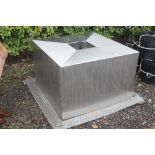 A stainless steel water feature