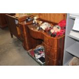 A walnut dressing table fitted six drawers