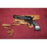 A Crossman .22 Co2 powered 6 shot pistol with hols